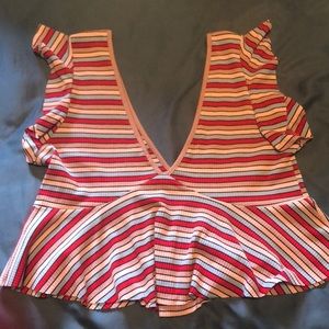 Striped deep V peplum top